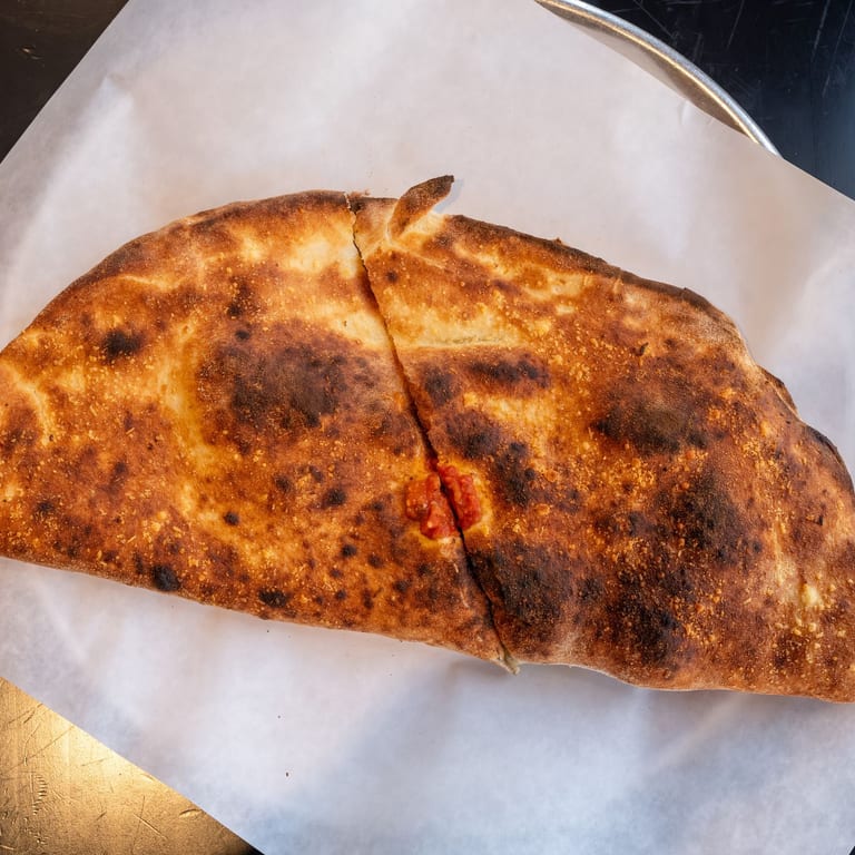 Savor Our Calzone Today