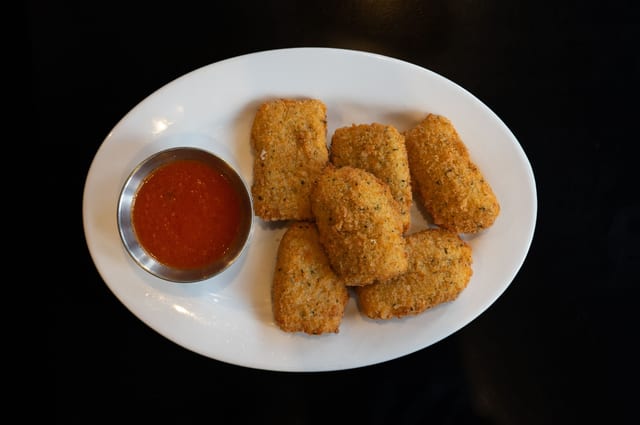 Fried Homemade Mozzarella “Mezzaluna”.
